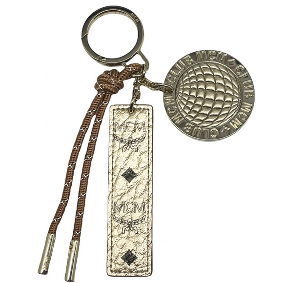 MCM New In Box Gold Charm Key Chain - Picture 1 of 8